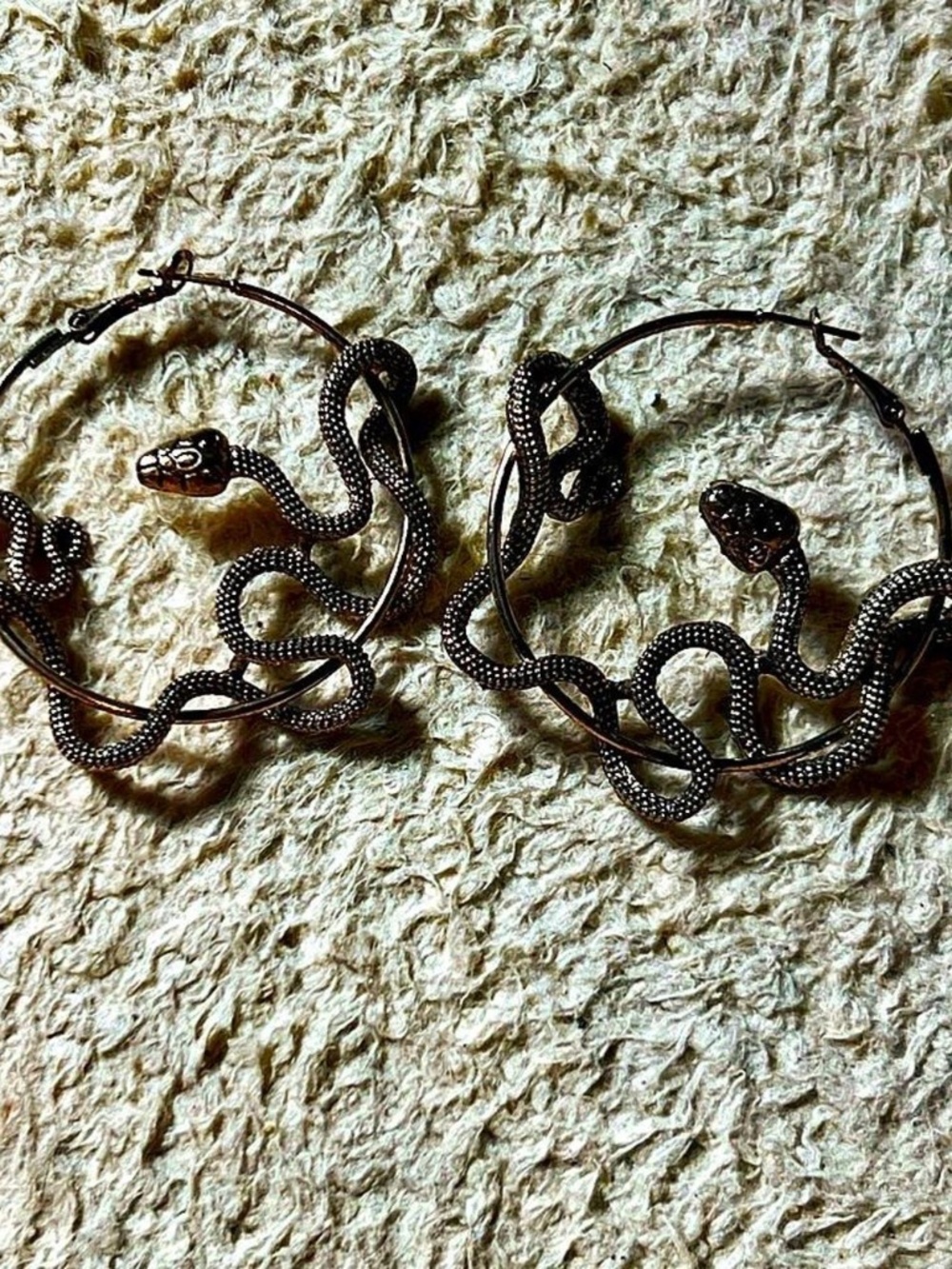 Gold snake hoop earrings